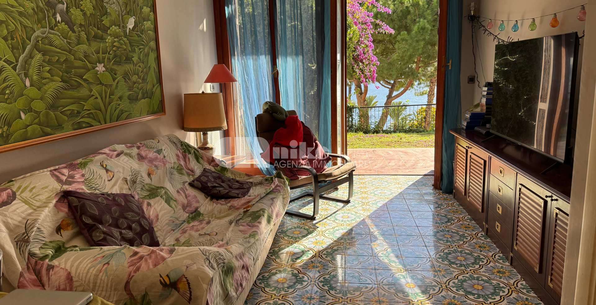 Trilocale con giardino vista mare